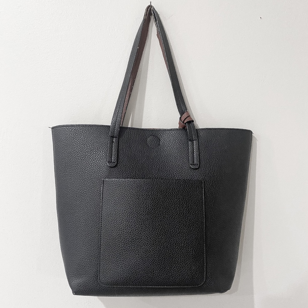 Two sided/reversible faux leather tote in black and brown